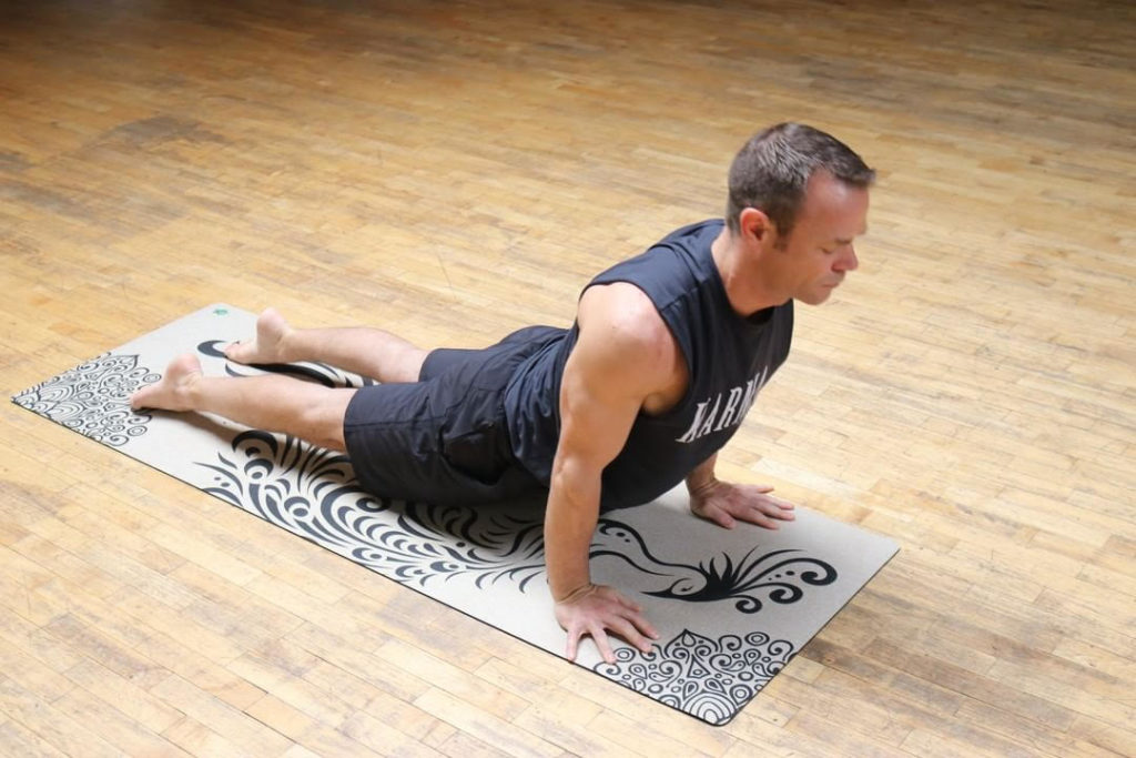man-on-yoga-mat