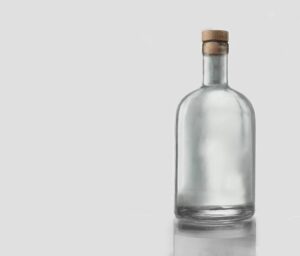 glass-bottle-with-cork-white-background