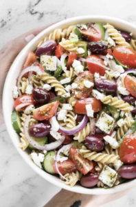 greek pasta salad with feta, tomatoes, onions, and peppers