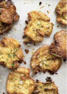 crispy roasted potato bites garnished with herbs