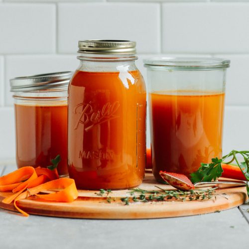 vegetable-broth-pots-tiled-background