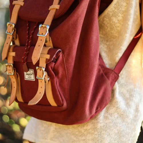 Person with backpack outdoors