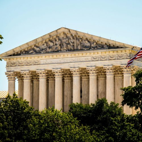 photo of supreme court with usa flag