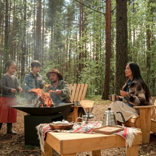 group-camping-in-forest-making-food